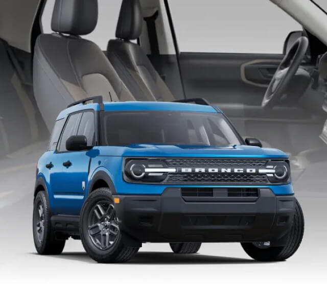 A blue Ford Bronco Sport isolated on a background showing a black Bronco Sport interior.